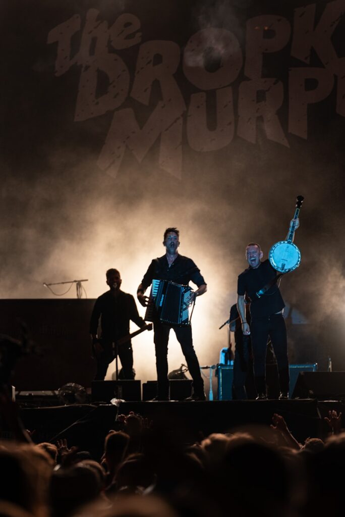 A group of people standing on top of a stage